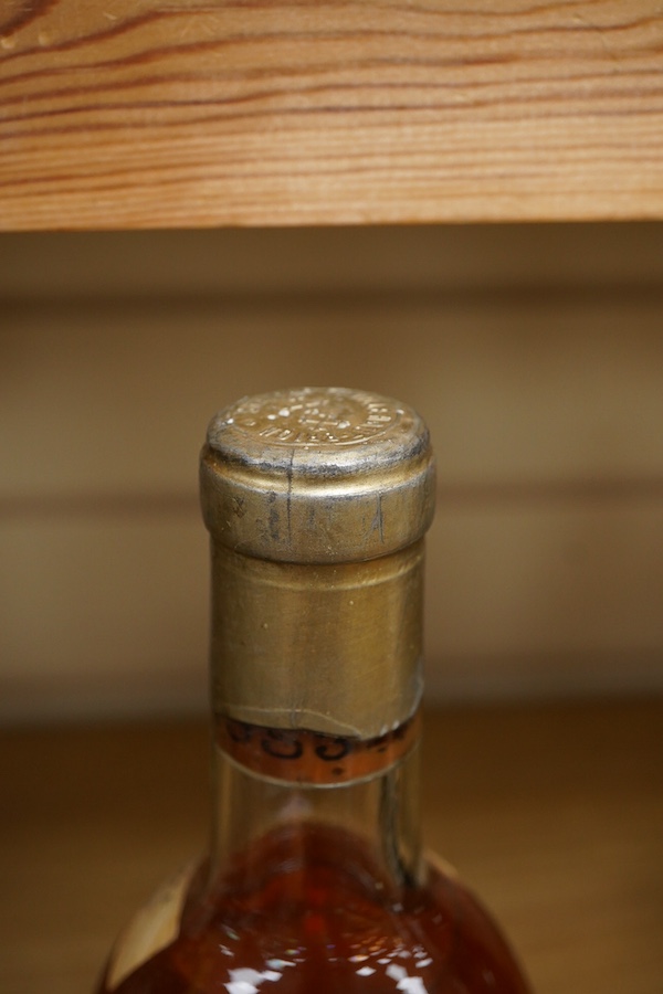 A bottle of Chateau Haut Brion, 1953, imported by FS Matta, London